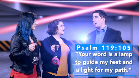 A screencap from one of the Bible intro videos showing the actors discussing Psalm 119:105 and modeling for kids how important it is to let God's Word guide our life