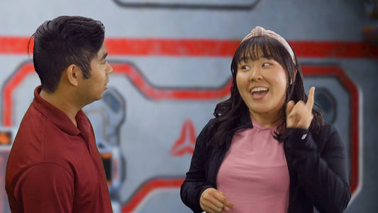 A screencap from one of the Bible intro videos showing Kiki and TJ discussing a Bible truth